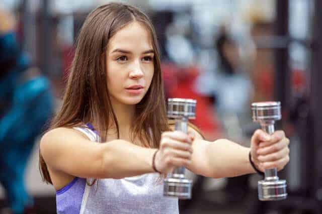 Young Girl with Dumbbells